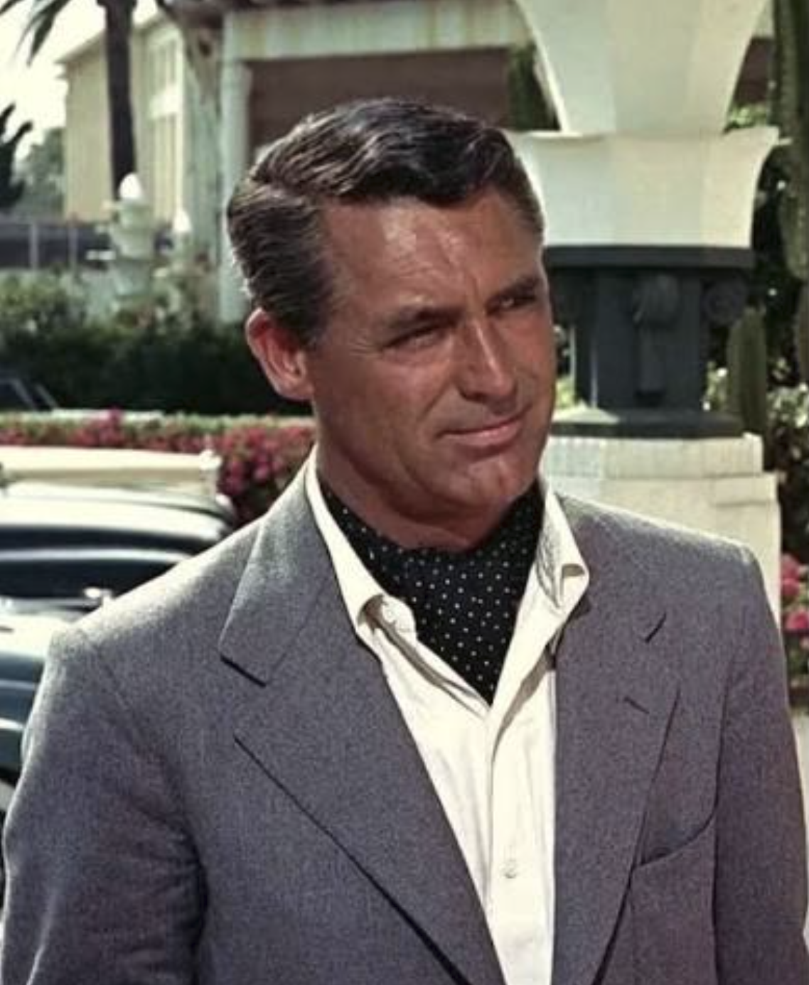 ALT Image: Gentleman wearing a classic silk ascot tie with formal menswear